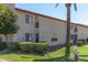 Apartment complex with 2 stories and a sign that reads 'The Palms' at 4401 E Hubbell St # 57, Phoenix, AZ 85008