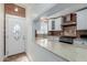 Modern kitchen featuring stainless steel appliances, granite countertops, and ample natural light at 4401 E Hubbell St # 57, Phoenix, AZ 85008