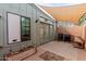 Relaxing patio with brick flooring, sunshade, and easy access to the house at 4401 E Hubbell St # 57, Phoenix, AZ 85008