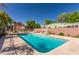 Sparkling community pool area with lounge seating, perfect for relaxation and enjoying the Arizona sun at 4401 E Hubbell St # 57, Phoenix, AZ 85008