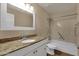 Clean bathroom with granite countertops and updated fixtures, combining functionality with modern style at 4434 E Thistle Landing Dr, Phoenix, AZ 85044