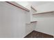 Well-organized closet with ample shelving, perfect for wardrobe storage and keeping belongings tidy at 4434 E Thistle Landing Dr, Phoenix, AZ 85044