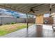 Spacious backyard featuring a covered patio with tile flooring and a view of the yard at 4513 W Yucca St, Glendale, AZ 85304