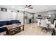 Combined living and kitchen area with modern gray cabinets and stainless steel appliances at 4513 W Yucca St, Glendale, AZ 85304