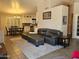 Inviting living room features a modern, comfortable couch, stylish decor, and tiled flooring, perfect for relaxation and entertaining at 4721 E Abraham Ln, Phoenix, AZ 85050