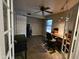 Spacious office space with good lighting, a ceiling fan and exterior window at 4721 E Abraham Ln, Phoenix, AZ 85050