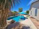 An inviting backyard pool area is ready for relaxation at 4721 E Abraham Ln, Phoenix, AZ 85050