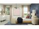 Bright bedroom featuring a comfortable bed, stylish decor, and ample natural light at 4748 E Amethyst Ln, San Tan Valley, AZ 85143