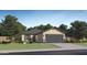 Charming single-story home with desert landscaping, neutral paint, gray roof and an attached two-car garage at 4748 E Amethyst Ln, San Tan Valley, AZ 85143