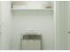 Clean and organized laundry room with ample storage space and a convenient folding area at 4748 E Amethyst Ln, San Tan Valley, AZ 85143