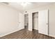 Bedroom with laminate floors, and a large closet at 4832 W Golden Ln, Glendale, AZ 85302