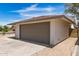 This clean two-car garage is connected to a single story home at 4832 W Golden Ln, Glendale, AZ 85302