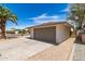 A well-maintained garage is attached to a single-story home at 4832 W Golden Ln, Glendale, AZ 85302