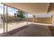 Covered back patio with view of the yard and the surrounding neighborhood at 4832 W Golden Ln, Glendale, AZ 85302