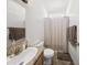 A standard bathroom features a sink, toilet, shower with curtain, and decorative hand towels at 500 N 67Th Ave # 52, Phoenix, AZ 85043