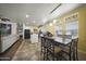 Bright dining area featuring a large table and view to kitchen at 500 N 67Th Ave # 52, Phoenix, AZ 85043