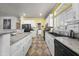 Well-lit kitchen featuring updated appliances and ample counter space at 500 N 67Th Ave # 52, Phoenix, AZ 85043