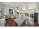 Open-concept living room with hardwood floors and comfortable seating at 500 N 67Th Ave # 52, Phoenix, AZ 85043
