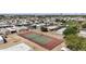 Aerial shot of a well-maintained tennis court in a residential neighborhood at 500 N 67Th Ave # 52, Phoenix, AZ 85043