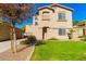 Charming two-story home with a well-maintained lawn and appealing curb appeal at 546 E San Carlos Way, Chandler, AZ 85249