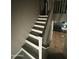 Staircase in the home going up to the second level and ceramic tile landing at 546 E San Carlos Way, Chandler, AZ 85249