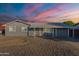 Inviting single-story home with a well-maintained xeriscaped front yard at 5801 W Cortez St, Glendale, AZ 85304