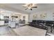Open concept living space with kitchen, dining area, and living room for seamless entertaining at 5801 W Cortez St, Glendale, AZ 85304