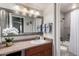 Well-lit bathroom with modern fixtures, a vanity with ample storage, and a combined shower-tub, providing a functional space at 5995 N 78Th St # 2004, Scottsdale, AZ 85250