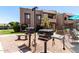Community outdoor grilling area with multiple grills and seating, ideal for social gatherings and summer cookouts at 5995 N 78Th St # 2004, Scottsdale, AZ 85250
