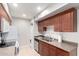 Functional kitchen features ample counter space, wood cabinets, and modern appliances at 5995 N 78Th St # 2004, Scottsdale, AZ 85250