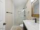 Stylish bathroom featuring a walk-in shower and a vanity with a marble countertop at 6154 E Karen Dr, Scottsdale, AZ 85254