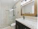 Modern bathroom featuring a walk-in shower and a vanity with a marble countertop at 6154 E Karen Dr, Scottsdale, AZ 85254