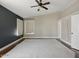 The primary bedroom with hardwood floors, multiple windows, and neutral paint at 6154 E Karen Dr, Scottsdale, AZ 85254
