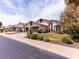 Charming home featuring a three car garage, beautiful landscaping, and desert plants in the front yard at 6154 E Karen Dr, Scottsdale, AZ 85254
