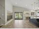Open-concept kitchen with a large island, granite countertops, stainless steel appliances, and backyard access at 6154 E Karen Dr, Scottsdale, AZ 85254
