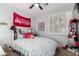 Bright bedroom with a comfortable bed, playful decor, and natural light, ideal for relaxation at 6204 W Hedgehog Pl, Phoenix, AZ 85083