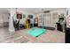 Spacious game room equipped with modern entertainment and a plush carpet at 6204 W Hedgehog Pl, Phoenix, AZ 85083
