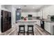 Modern kitchen featuring a large center island, stainless steel appliances, and plenty of cabinet space at 6204 W Hedgehog Pl, Phoenix, AZ 85083