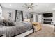 Inviting main bedroom featuring a king bed, elegant furnishings, and a cozy seating area at 6204 W Hedgehog Pl, Phoenix, AZ 85083
