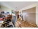 Bedroom showcasing hardwood floors, a desk, and ample storage in a large closet at 6313 W Paradise Ln, Glendale, AZ 85306