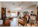 Bright living room featuring wood floors, comfortable seating, and stylish decor at 6313 W Paradise Ln, Glendale, AZ 85306