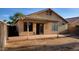 View of the backyard featuring a covered patio with a brick paved area and privacy fence at 6784 W Gardenia Ave, Glendale, AZ 85303