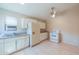 Functional kitchen featuring white cabinets and appliances, with ample counter space at 7038 W Fillmore St, Phoenix, AZ 85043