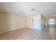 Spacious living room with tile floors and a bright, airy feel at 7038 W Fillmore St, Phoenix, AZ 85043