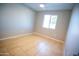 Bedroom with tile flooring and natural light at 7136 W Cheryl Dr, Peoria, AZ 85345