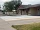 Charming single-story home featuring a spacious driveway and well-maintained front yard at 7136 W Cheryl Dr, Peoria, AZ 85345