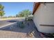 Landscaped front yard featuring desert plants, decorative rocks, and a well-maintained lawn at 7136 W Cheryl Dr, Peoria, AZ 85345