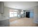 Bright, open kitchen with modern appliances, sleek gray cabinets, and abundant natural light at 7136 W Cheryl Dr, Peoria, AZ 85345