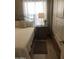 Bedroom featuring a cozy bed with decorative pillows and a decorative plant at 8700 E University Dr # 124, Mesa, AZ 85207
