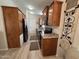 Well-equipped kitchen boasts wooden cabinets, granite countertops, and modern stainless steel appliances at 8700 E University Dr # 124, Mesa, AZ 85207